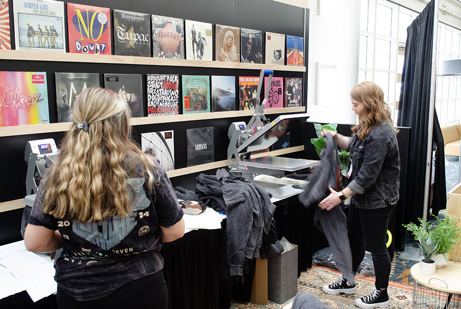 Girls heat pressing shirts
